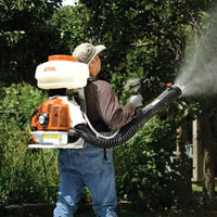 Thumbnail for STIHL SR 450 in Use for Tree Spraying – A professional operator using the STIHL SR 450 to apply liquid treatment with a maximum spray range of 48 feet.