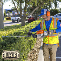 Thumbnail for A professional landscaper using the STIHL HS 87 T hedge trimmer to shape hedges, highlighting its powerful performance and ease of use.