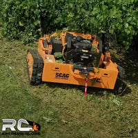 Thumbnail for Scag RC Extreme Slope™ Mower in action, tackling dense vegetation and uneven terrain with its powerful 37 HP Vanguard BIG BLOCK™ engine and hybrid 7.4kw alternator